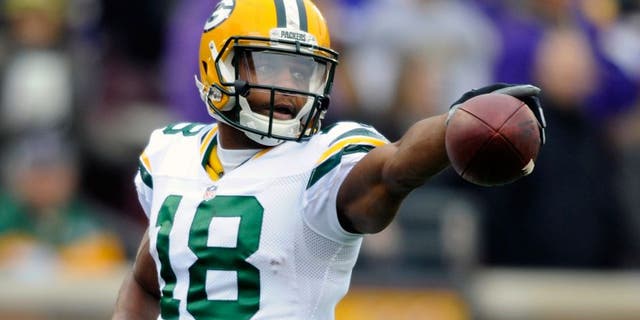 MINNEAPOLIS, MN - NOVEMBER 23: Randall Cobb #18 of the Green Bay Packers celebrates a play against the Minnesota Vikings during the first quarter of the game on November 23, 2014 at TCF Bank Stadium in Minneapolis, Minnesota. The Packers defeated the Vikings 24-21. (Photo by Hannah Foslien/Getty Images)