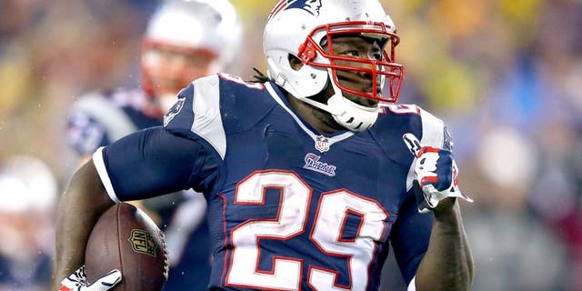 FOXBORO, MA - JANUARY 11: LeGarrette Blount #29 of the New England Patriots runs a 73 yard touchdown in the fourth quarter against the Indianapolis Colts during the AFC Divisional Playoff game at Gillette Stadium on January 11, 2014 in Foxboro, Massachusetts. (Photo by Al Bello/Getty Images)