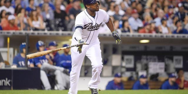 SAN DIEGO, CA - AUGUST 31: Justin Upton #10 of the San Diego Padres plays during a baseball game against the Texas Rangers at Petco Park August, 31, 2015 in San Diego, California. (Photo by Denis Poroy/Getty Images)