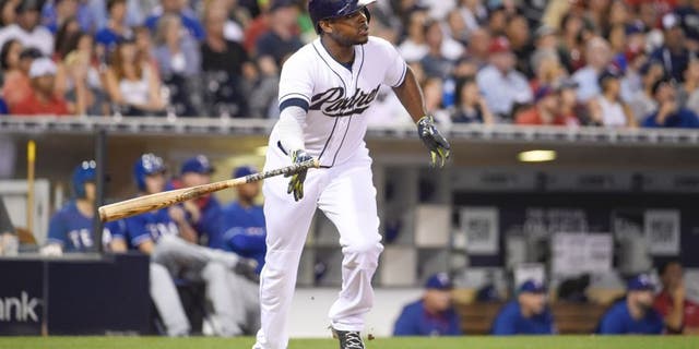 SAN DIEGO, CA - AUGUST 31: Justin Upton #10 of the San Diego Padres plays during a baseball game against the Texas Rangers at Petco Park August, 31, 2015 in San Diego, California. (Photo by Denis Poroy/Getty Images)