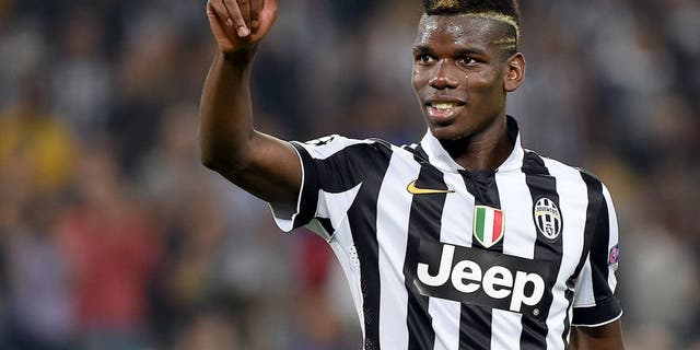TURIN, ITALY - SEPTEMBER 16: Paul Pogba of Juventus salutes the fans at the end of the UEFA Champions League Group A match between Juventus and Malmo FF on September 16, 2014 in Turin, Italy. (Photo by Valerio Pennicino/Getty Images)