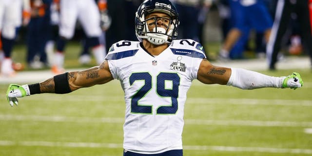 EAST RUTHERFORD, NJ - FEBRUARY 02: Free safety Earl Thomas #29 of the Seattle Seahawks gestures during the second quarter Super Bowl XLVIII at MetLife Stadium on February 2, 2014 in East Rutherford, New Jersey. (Photo by Tom Pennington/Getty Images)