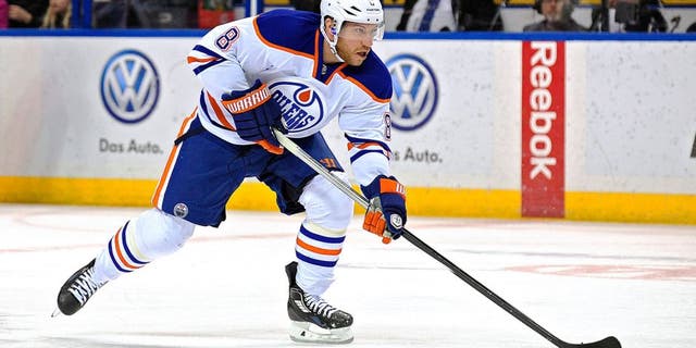 Jan 13, 2015; St. Louis, MO, USA; Edmonton Oilers center Derek Roy (8) handles the puck against the St. Louis Blues during the first period at Scottrade Center. Mandatory Credit: Jeff Curry-USA TODAY Sports