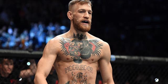 LAS VEGAS, NEVADA - DECEMBER 12: Conor McGregor of Ireland stands in his corner before facing Jose Aldo of Brazil in their featherweight championship bout during the UFC 194 event inside MGM Grand Garden Arena on December 12, 2015 in Las Vegas, Nevada. (Photo by Jeff Bottari/Zuffa LLC/Zuffa LLC via Getty Images)