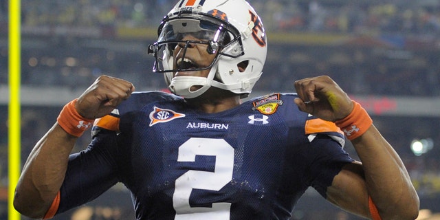 Jan. 10: Auburn's Cam Newton reacts after a touchdown during the first half of the BCS National Championship NCAA college football game against Oregon in Glendale, Ariz.