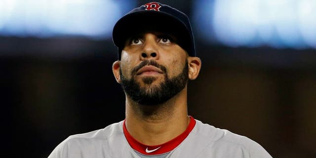 Sep 27, 2016; Bronx, NY, USA; Boston Red Sox starting pitcher David Price (24) reacts after giving up a two-run home run to New York Yankees first baseman Tyler Austin (26) during the seventh inning at Yankee Stadium. Mandatory Credit: Adam Hunger-USA TODAY Sports