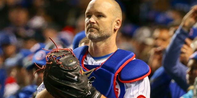 Oct 30, 2016; Chicago, IL, USA; Chicago Cubs catcher David Ross (3) stands in the dugout before game five of the 2016 World Series against the Cleveland Indians at Wrigley Field. Mandatory Credit: Jerry Lai-USA TODAY Sports