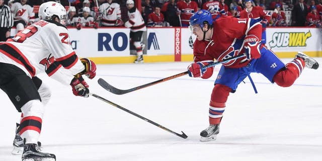 MONTREAL, QC - JANUARY 6: Brendan Gallagher #11 of the Montreal Canadiens takes a shot against the New Jersey Devils in the NHL game at the Bell Centre on January 6, 2016 in Montreal, Quebec, Canada. (Photo by Francois Lacasse/NHLI via Getty Images)