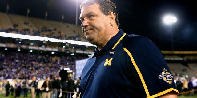 Dec 28, 2013; Tempe, AZ, USA; Michigan Wolverines head coach Brady Hoke against the Kansas State Wildcats during the Buffalo Wild Wings Bowl at Sun Devil Stadium. Mandatory Credit: Mark J. Rebilas-USA TODAY Sports