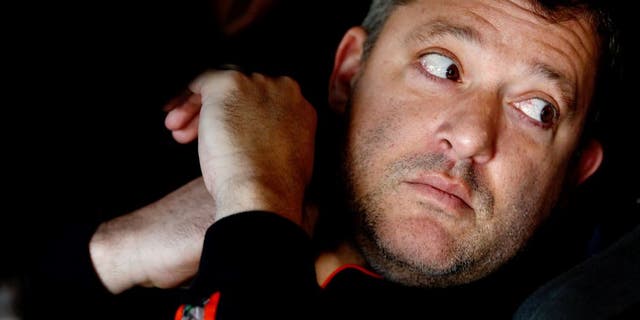 MARTINSVILLE, VA - OCTOBER 30: Tony Stewart, driver of the #14 Bass Pro Shops/Mobil 1 Chevrolet, sits in his car in the garage area during practice for the NASCAR Sprint Cup Series Goody's Headache Relief Shot 500 at Martinsville Speedway on October 30, 2015 in Martinsville, Virginia. (Photo by Jeff Zelevansky/Getty Images)