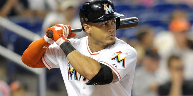 Aug 1, 2013; Miami, FL, USA; Miami Marlins right fielder Giancarlo Stanton (27) at bat against the New York Mets at Marlins Park. Mandatory Credit: Steve Mitchell-USA TODAY Sports