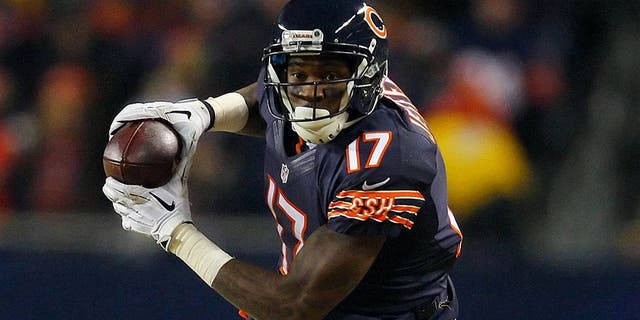 Dec 29, 2013; Chicago, IL, USA; Chicago Bears wide receiver Alshon Jeffery (17) makes a 67 yard pass reception with Green Bay Packers cornerback Sam Shields (37) defending during the second half at Soldier Field. Green Bay won 33-28. Mandatory Credit: Dennis Wierzbicki-USA TODAY Sports