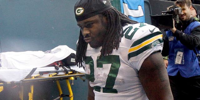 Green Bay Packers' Eddie Lacy looks down as he walks off the field after overtime of the NFL football NFC Championship game against the Seattle Seahawks Sunday, Jan. 18, 2015, in Seattle. The Seahawks won 28-22 to advance to Super Bowl XLIX. (AP Photo/Jeff Chiu)