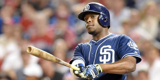 WASHINGTON, DC - AUGUST 26: Justin Upton #10 of the San Diego Padres takes a swing during a baseball game against the Washington Nationals at Nationals Park on August 26, 2015 in Washington, DC. The Padres won 6-5. (Photo by Mitchell Layton/Getty Images)