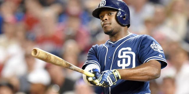 WASHINGTON, DC - AUGUST 26: Justin Upton #10 of the San Diego Padres takes a swing during a baseball game against the Washington Nationals at Nationals Park on August 26, 2015 in Washington, DC. The Padres won 6-5. (Photo by Mitchell Layton/Getty Images)