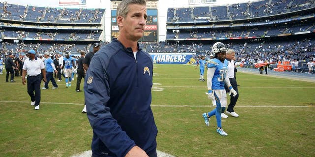 Oct 25, 2015; San Diego, CA, USA; San Diego Chargers offensive coordinator Frank Reich walks off the field after the Chargers lost to the Oakland Raiders 39-27 at Qualcomm Stadium. Mandatory Credit: Jake Roth-USA TODAY Sports