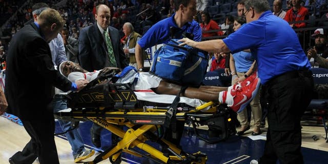 Jan 17, 2017; Oxford, MS, USA; Mississippi Rebels guard Rasheed Brooks (14) is taken off the court during the second half against the Tennessee Volunteers at The Pavilion at Ole Miss. Mandatory Credit: Justin Ford-USA TODAY Sports