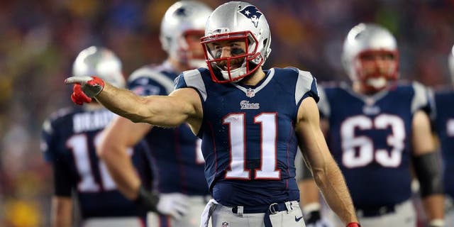 FOXBORO, MA - JANUARY 18: Julian Edelman #11 of the New England Patriots reacts after a play in the first quarter against the Indianapolis Colts of the 2015 AFC Championship Game at Gillette Stadium on January 18, 2015 in Foxboro, Massachusetts. (Photo by Jim Rogash/Getty Images)