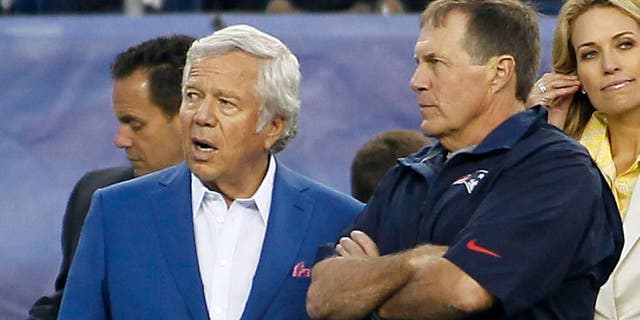 Aug 29, 2013; Foxborough, MA, USA; New England Patriots owner Robert Kraft (left) and head coach Bill Belichick talk on the sideline prior to a preseason game against the New York Giants at Gillette Stadium. Mandatory Credit: Stew Milne-USA TODAY Sports