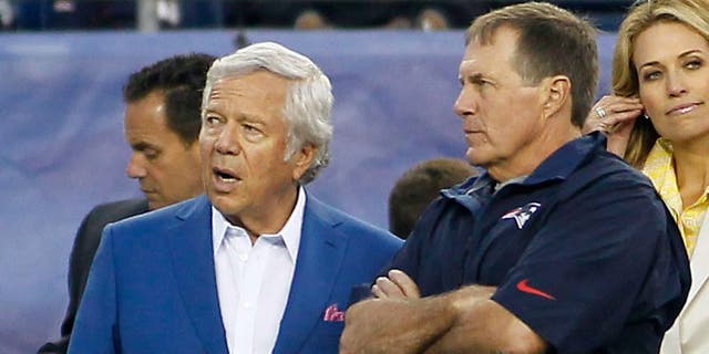 Aug 29, 2013; Foxborough, MA, USA; New England Patriots owner Robert Kraft (left) and head coach Bill Belichick talk on the sideline prior to a preseason game against the New York Giants at Gillette Stadium. Mandatory Credit: Stew Milne-USA TODAY Sports