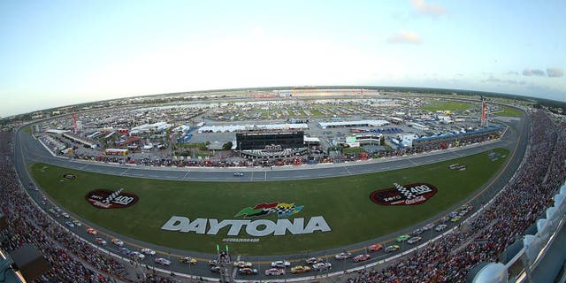 DAYTONA BEACH, FL - JULY 06: (Lead cars from top) Kyle Busch, driver of the #18 Interstate Batteries Toyota and Matt Kenseth, driver of the #20 Home Depot / Husky Toyota, lead the field at the start of the NASCAR Sprint Cup Series Coke Zero 400 at Daytona International Speedway on July 6, 2013 in Daytona Beach, Florida. (Photo by Mike Ehrmann/Getty Images)