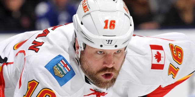 TORONTO, ON - APRIL 1: Brian McGrattan #16 of the Calgary Flames looks on during NHL game action against the Toronto Maple Leafs April 1, 2014 at the Air Canada Centre in Toronto, Ontario, Canada. (Photo by Graig Abel/NHLI via Getty Images)