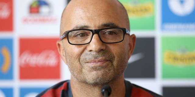 Chilean national football team, Argentinian Jorge Sampaoli, gestures as he speaks during a press conference in Santiago, Chile, on January 13, 2016. Chile coach Jorge Sampoali appears on the verge of quitting six months after guiding La Roja to the Copa America, with the Argentine claiming he is being held "hostage" by the federation. AFP PHOTO/CLAUDIO REYES / AFP / Claudio Reyes (Photo credit should read CLAUDIO REYES/AFP/Getty Images)