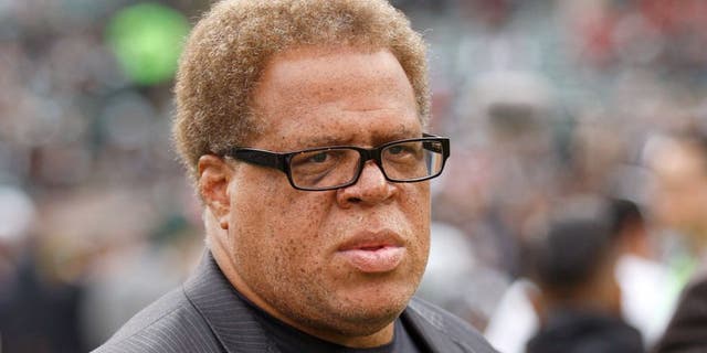 OAKLAND, CA - DECEMBER 7: General Manager Reggie McKenzie of the Oakland Raiders stands of the field prior to the game against the San Francisco 49ers at O.co Coliseum on December 7, 2014 in Oakland, California. The Raiders defeated the 49ers 24-13. (Photo by Michael Zagaris/San Francisco 49ers/Getty Images)