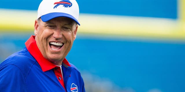 ORCHARD PARK, NY - AUGUST 14: Head coach Rex Ryan of the Buffalo Bills laughs with players before the game against the Carolina Panthers on August 14, 2015 at Ralph Wilson Stadium in Orchard Park, New York. (Photo by Brett Carlsen/Getty Images)