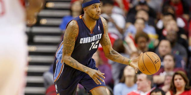 Feb 2, 2013; Houston, TX, USA; Charlotte Bobcats power forward Tyrus Thomas (12) looks for an outlet pass against the Houston Rockets during the first quarter at the Toyota Center. Mandatory Credit: Thomas Campbell:USA TODAY Sports