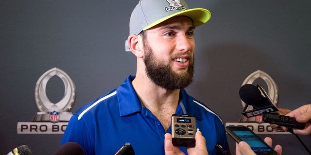 Jan 21, 2015; Phoenix, AZ, USA; Indianapolis Colts quarterback Andrew Luck (12) addresses the media after being selected first overall by Team Carter during the Pro Bowl Draft at The Arizona Biltmore. Mandatory Credit: Kyle Terada-USA TODAY Sports