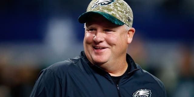 ARLINGTON, TX - NOVEMBER 08: Head coach Chip Kelly of the Philadelphia Eagles talks with players during warm-ups prior to the game against the Dallas Cowboys on November 8, 2015 in Arlington, Texas. (Photo by Jamie Squire/Getty Images)