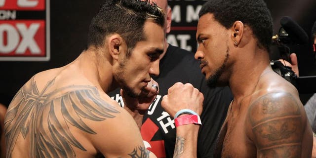 EAST RUTHERFORD, NJ - MAY 04: (L-R) Lightweight opponents Tony Ferguson and Michael Johnson face off after weighing in during the UFC on FOX official weigh in at Izod Center on May 4, 2012 in East Rutherford, New Jersey. (Photo by Josh Hedges/Zuffa LLC/Zuffa LLC via Getty Images)