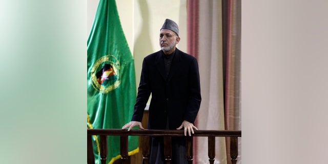 Afghan President Hamid Karzai addesses military officers in Kabul, Afghanistan, Saturday, Feb. 16, 2013. Afghan President Hamid Karzai said Saturday he plans to issue a decree banning Afghan security forces from asking international troops to carry out airstrikes under ``any circumstances.” The announcement came amid anger over a joint Afghan-NATO operation this week that Afghan officials said killed 10 civilians, including women and children, in northeast Kunar province.(AP Photo/Ahmad Jamshid)