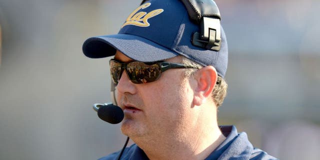 Nov 9, 2013; Berkeley, CA, USA; California Golden Bears coach Sonny Dykes reacts during the game against the Southern California Trojans at Memorial Stadium. USC defeated California 62-28. Mandatory Credit: Kirby Lee-USA TODAY Sports