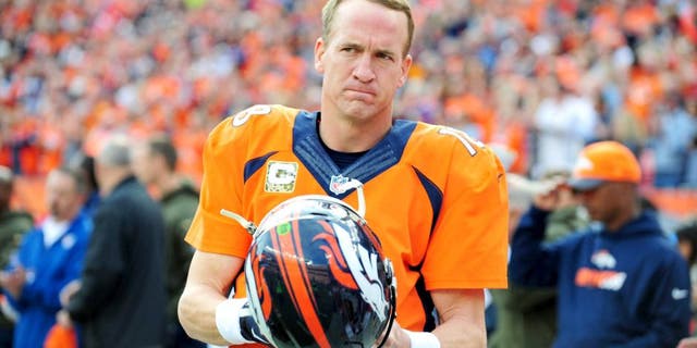 Nov 15, 2015; Denver, CO, USA; Denver Broncos quarterback Peyton Manning (18) before the game against the Kansas City Chiefs at Sports Authority Field at Mile High. Mandatory Credit: Ron Chenoy-USA TODAY Sports