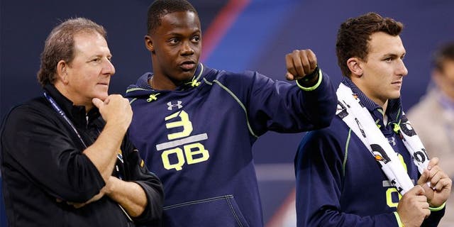 INDIANAPOLIS, IN - FEBRUARY 23: Former Louisville quarterback Teddy Bridgewater (center) and former Texas A&M quarterback Johnny Manziel stand alongside Jacksonville Jaguars assistant Frank Scelfo during the 2014 NFL Combine at Lucas Oil Stadium on February 23, 2014 in Indianapolis, Indiana. (Photo by Joe Robbins/Getty Images)