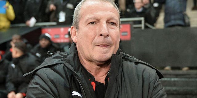 Rennes' French coach Rolland Courbis looks on before the French L1 football match between Rennes (Stade Rennais FC) and Ajaccio (GFC ) on January 22, 2016, at the Roazhon Park in Rennes, northwestern France. AFP PHOTO / JEAN-FRANCOIS MONIER / AFP / JEAN-FRANCOIS MONIER (Photo credit should read JEAN-FRANCOIS MONIER/AFP/Getty Images)