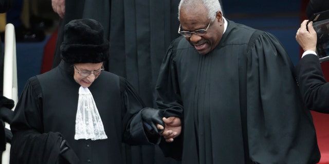 Jan. 21, 2013: Supreme Court associate justices Ruth Bader Ginsburg, left and Clarence Thomas arrive at the ceremonial swearing-in for President Barack Obama at the U.S. Capitol during the 57th Presidential Inauguration.