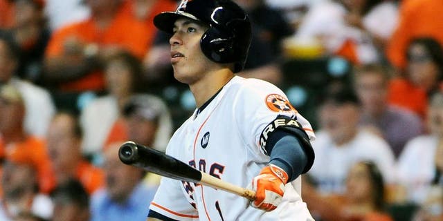 HOUSTON, TX - OCTOBER 12: Carlos Correa #1 of the Houston Astros hits a solo home run to tie the game in the third inning against the Kansas City Royals during game four of the American League Divison Series at Minute Maid Park on October 12, 2015 in Houston, Texas. (Photo by Eric Christian Smith/Getty Images)