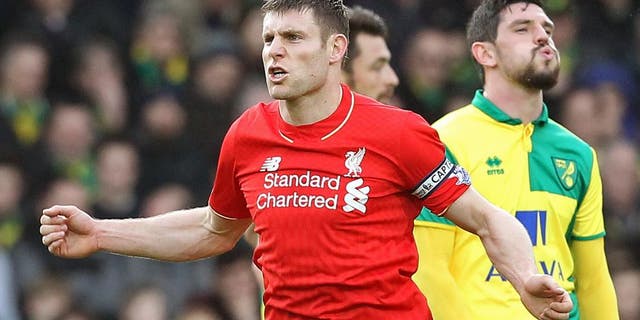 LiverpoolÃÂs captain English midfielder James Milner celebrates scoring their fourth goal during the English Premier League football match between Norwich City and Liverpool at Carrow Road in Norwich, eastern England, on January 23, 2016. AFP PHOTO / LINDSEY PARNABY RESTRICTED TO EDITORIAL USE. No use with unauthorized audio, video, data, fixture lists, club/league logos or 'live' services. Online in-match use limited to 75 images, no video emulation. No use in betting, games or single club/league/player publications. / AFP / LINDSEY PARNABY (Photo credit should read LINDSEY PARNABY/AFP/Getty Images)