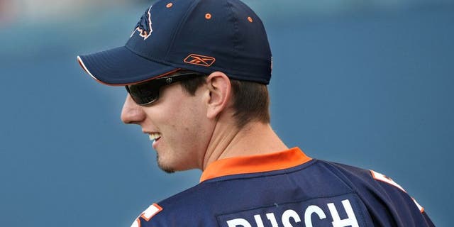 DENVER - AUGUST 30: NASCAR driver Kyle Busch of Las Vegas, Nevada checks out the pregame action on the field prior to the Arizona Cardinals meeting the Denver Broncos during NFL preseason action at Invesco Field August 30, 2007 in Denver, Colorado. (Photo by Doug Pensinger/Getty Images) *** Local Caption *** Kyle Busch