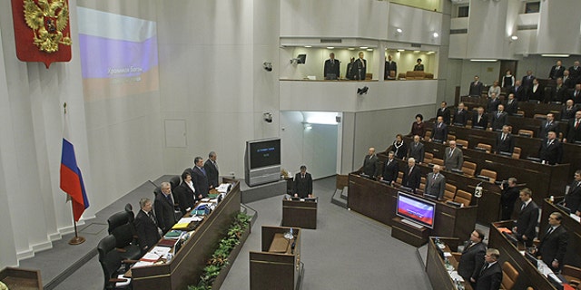 Jan. 26: Members of Russia's Federation Council, the upper house of parliament, listen to the Russian national anthem at a parliament session in Moscow, Russia.