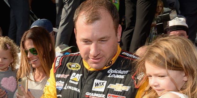HOMESTEAD, FL - NOVEMBER 22: Ryan Newman and family meet the Minions at NASCAR Ford Championship Weekend in celebration of Minions on digital HD on November 24 and Blu-ray & DVD on December 8. (Photo by Gustavo Caballero/Getty Images For Universal Pictures Home Entertainment)