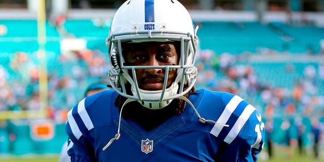 Dec 27, 2015; Miami Gardens, FL, USA; Indianapolis Colts wide receiver T.Y. Hilton (13) celebrates after a game against the Miami Dolphins at Sun Life Stadium. The Colts won 18-12. Mandatory Credit: Steve Mitchell-USA TODAY Sports