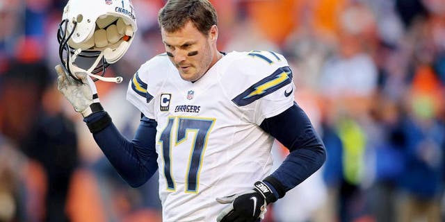 Jan 3, 2016; Denver, CO, USA; San Diego Chargers quarterback Philip Rivers (17) during the first half against the Denver Broncos at Sports Authority Field at Mile High. Mandatory Credit: Chris Humphreys-USA TODAY Sports