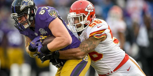 Kansas City Chiefs inside linebacker Derrick Johnson (56) tackles Baltimore Ravens tight end Maxx Williams (87) in the fourth quarter on Sunday, Dec. 20, 2015, at M&T Bank Stadium in Baltimore, Md. The Chiefs won, 34-14. (David Eulitt/Kansas City Star/TNS via Getty Images)