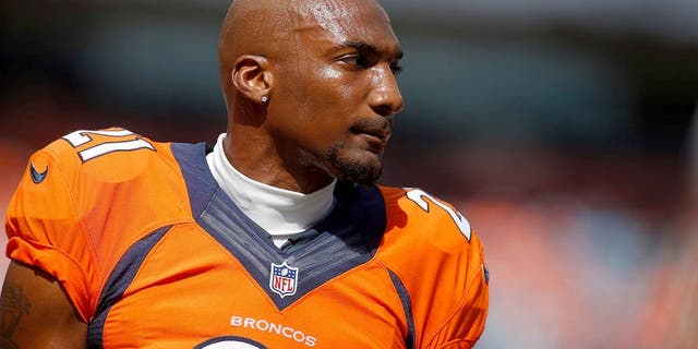 Sep 14, 2014; Denver, CO, USA; Denver Broncos cornerback Aqib Talib (21) before the game against the Kansas City Chiefs at Sports Authority Field at Mile High. Mandatory Credit: Chris Humphreys-USA TODAY Sports
