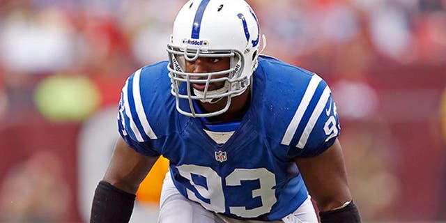 LANDOVER, MD - AUGUST 25: Dwight Freeney #93 of the Indianapolis Colts lines up against the Washington Redskins during a preseason NFL game at FedEx Field on August 25, 2012 in Landover, Maryland. The Redskins beat the Colts 30-17. (Photo by Joe Robbins/Getty Images)