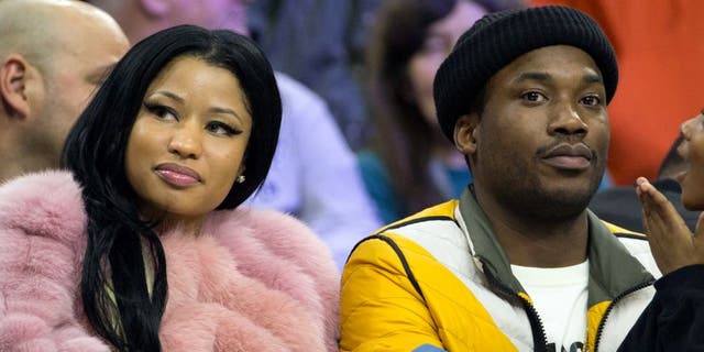 PHILADELPHIA, PA - JANUARY 26: Recording artists Nicki Minaj and Meek Mill look on during the game between the Phoenix Suns and Philadelphia 76ers on January 26, 2016 at the Wells Fargo Center in Philadelphia, Pennsylvania. (Mitchell Leff/Getty Images)